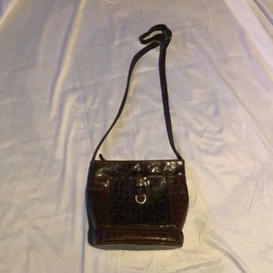 Brown vinyl purse with faux snake skin texture